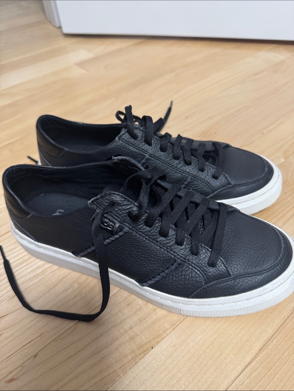 UGG Black Leather Low-Top Sneakers with White Sole